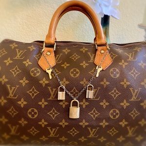 LV Vintage Lock Bag Charm